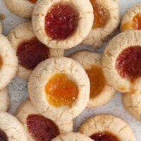 Image of thumbprint cookies with different jams on top of each